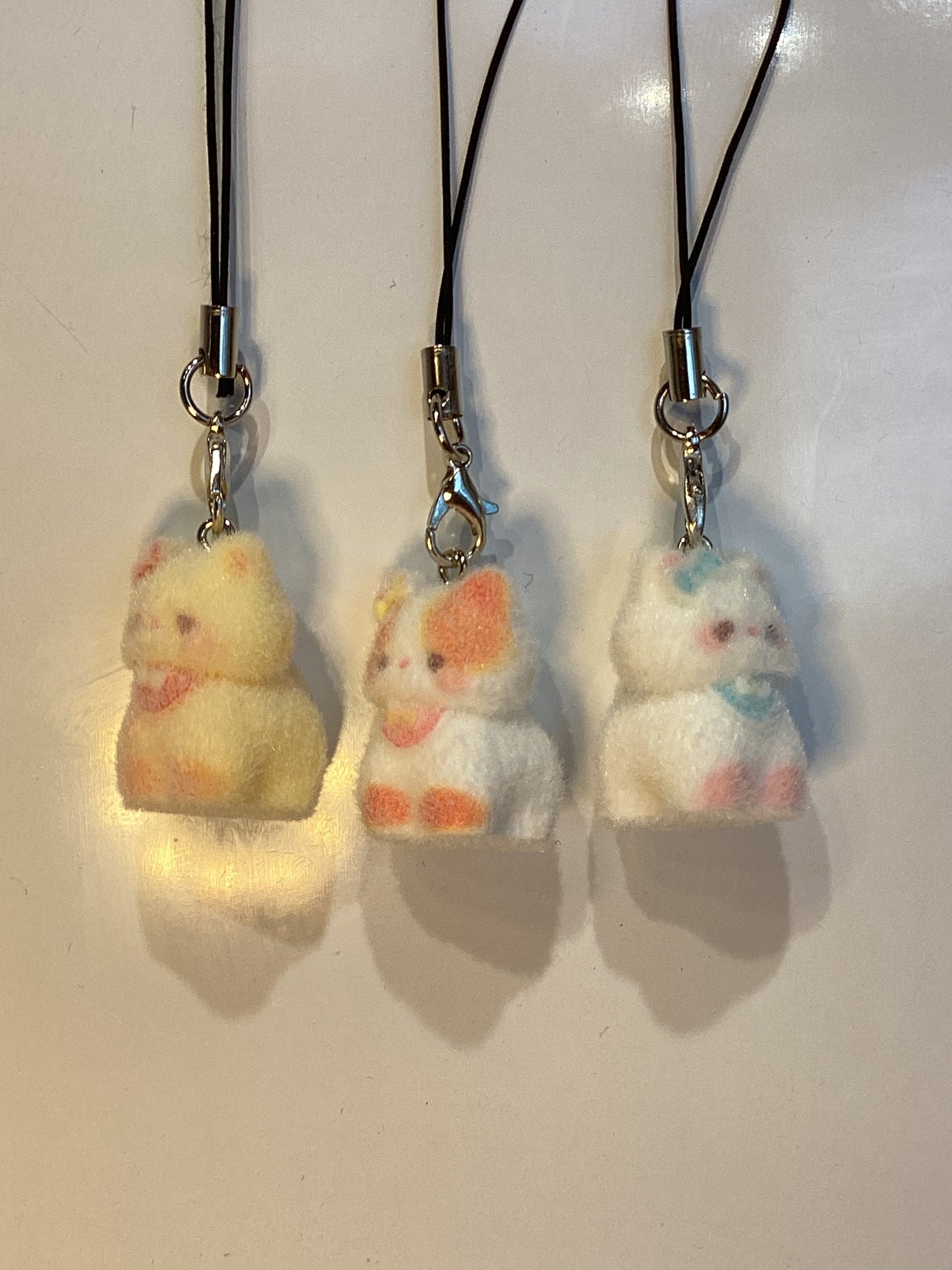fuzzy little phone charm