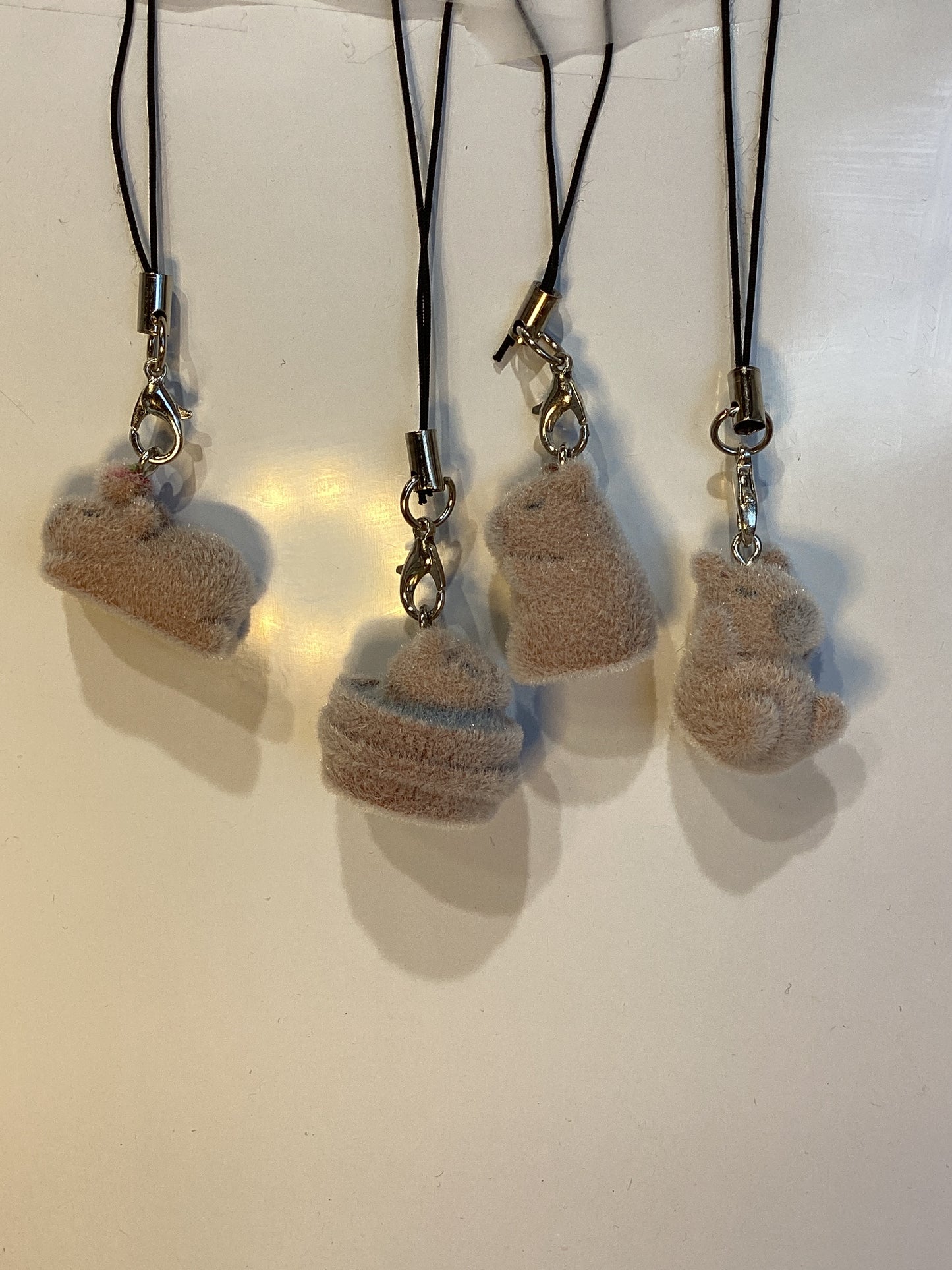 fuzzy little phone charm