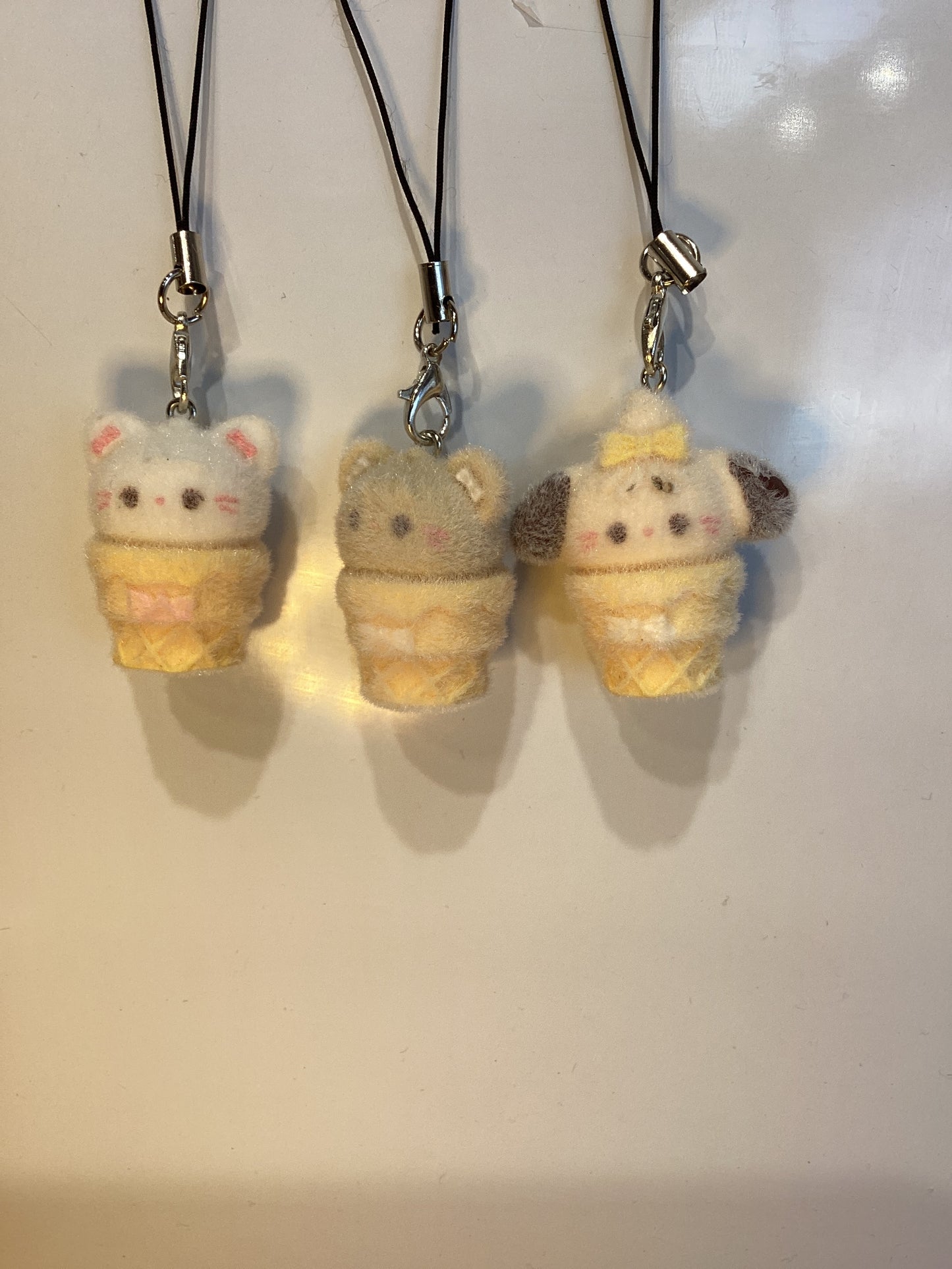 fuzzy little phone charm