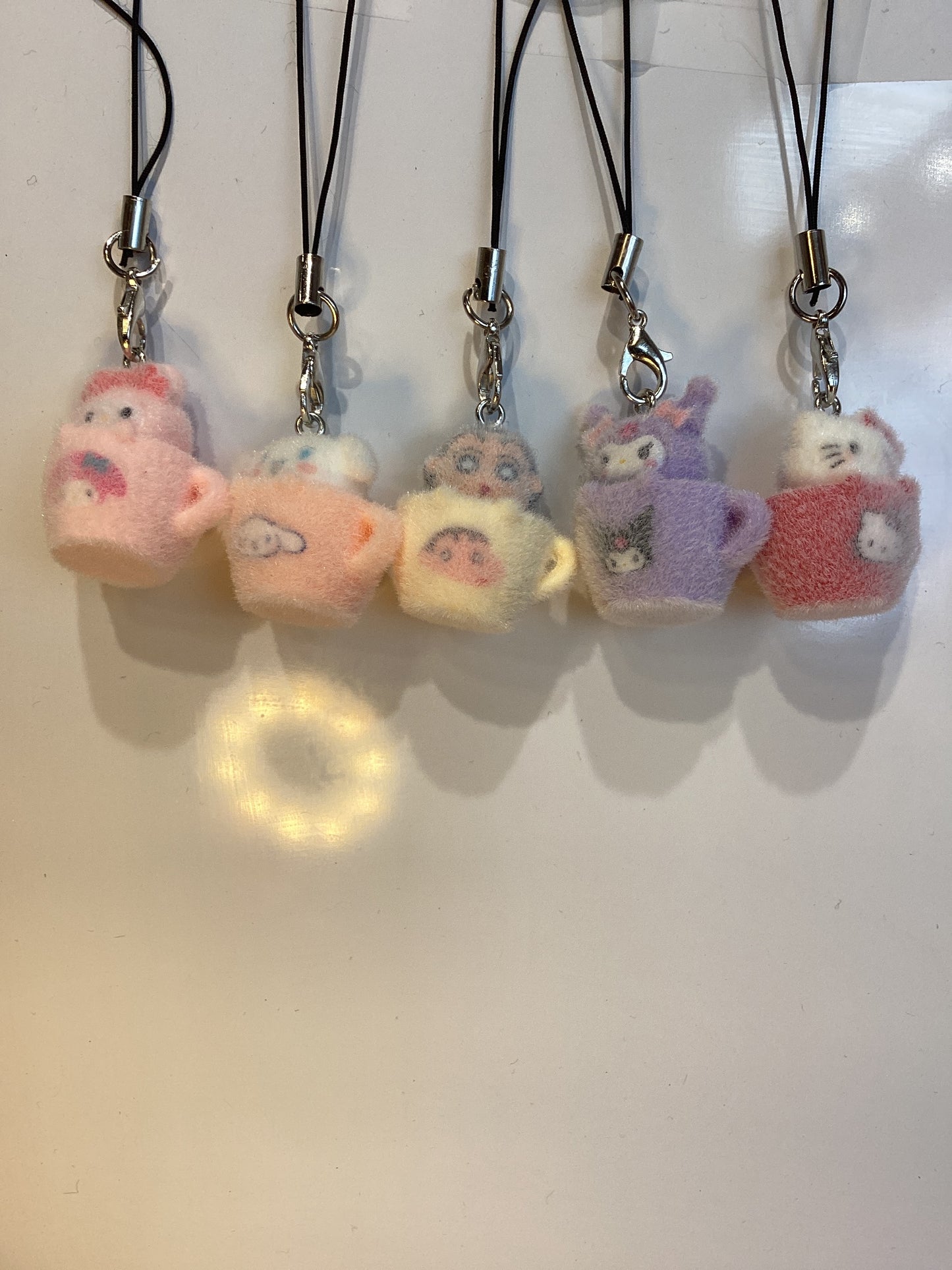 fuzzy little phone charm
