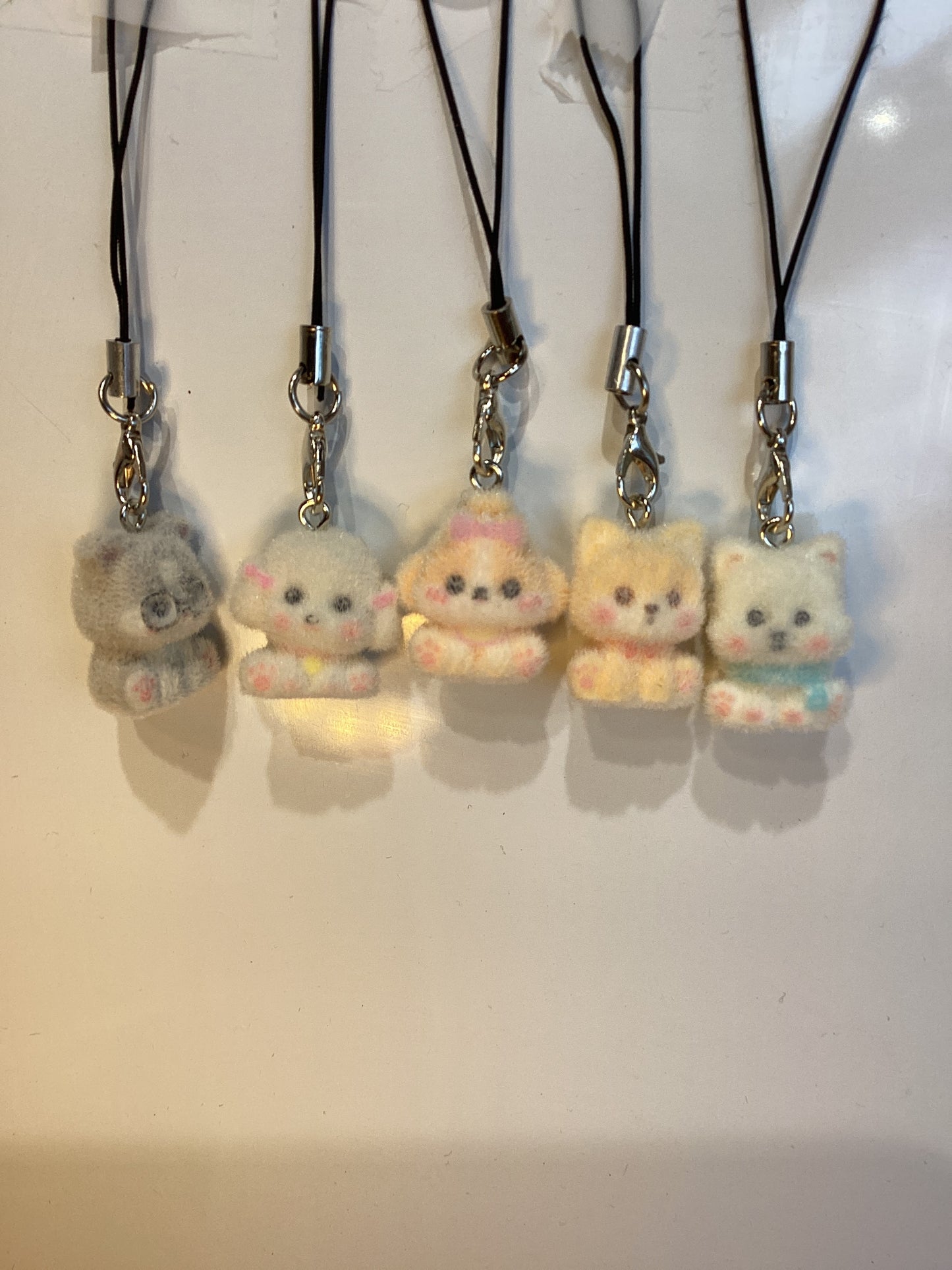 fuzzy little phone charm